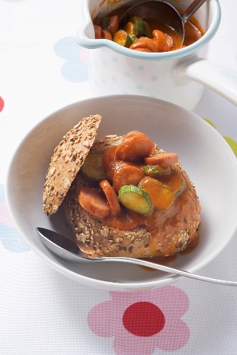 Sausage goulash in a bread roll