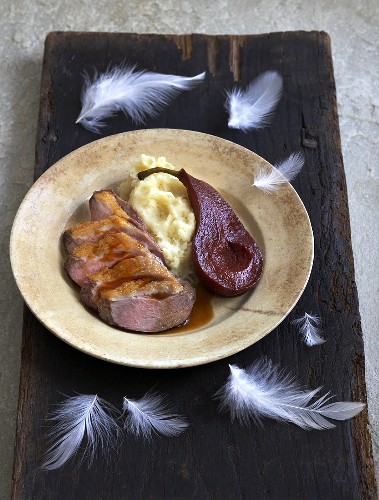 Duck breast with celeriac puree and red wine pear