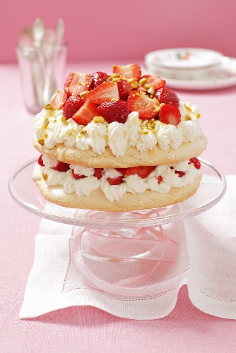 Pavlova with cream and strawberries