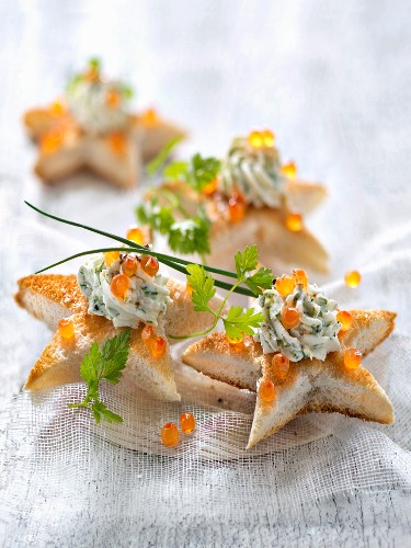 Herb cream cheese and salmon roe star toasts