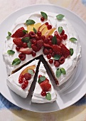 Cream gateau with almond sponge and berries