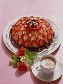 Domed strawberry gateau with chocolate curls