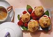 Cream puffs with raspberry cream