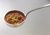 Soup Ladle with Pasta in Bell Pepper Mousse