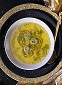 Clear Soup with Saffron and sliced Parsley Pancakes