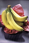 Bunch of Bananas on Pink Paper