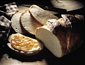 White Bread Loaf and Slices; Butter and Marmalade