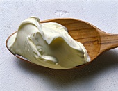 Dollop of Mascarpone Cheese on a Wooden Spoon