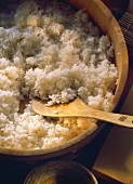 A wooden Bowl of Sushi Rice