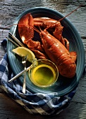 Boiled Lobster on Plate with Drawn Butter