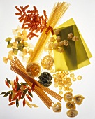 Various types of pasta on sheet of glass