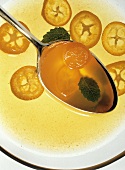 Orange and Kumquat Sauce on a Spoon