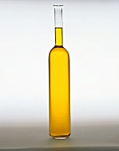 Olive Oil in tall narrow Glass Bottle