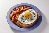 Fried Egg on a Slice of Bread with Tomatoes