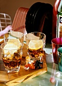 Three Glasses of Vermouth on the Rocks at a 1950's Party