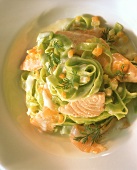 Green ribbon noodles with salmon