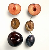 Assorted Plums; Whole and Cut in Half