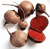 Several Red Beets; One Cut in Half