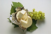 Marquis Cheese on Leaves with Grapes