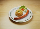 A Frankfurter with potato salad