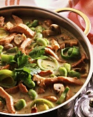 Stew with strips of smoked pork rib, leeks and broad beans