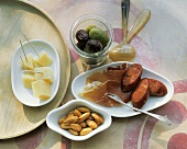 Tapas: cheese, salted almonds, olives, ham and chorizo