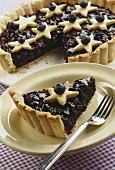 Blueberry tart decorated with pastry stars