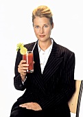 Woman Holding a Bloody Mary