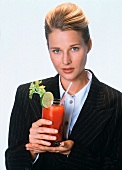 Woman with a Bloody Mary Cocktail