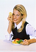 Woman Holding Fork with Twirled Spaghetti