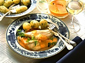 Pike-perch fillets on pepper sauce with parsley potatoes