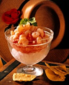 Shrimp cocktail: Tomato and Shrimp Salad on pushed Ice in a Cocktail Glass