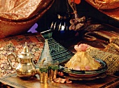 Moroccan still life with sweet couscous and fresh tea