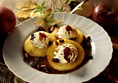 Stewed apple slices with raisins & whipped cream