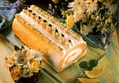 Sponge roll with lemon cream filling & pistachios
