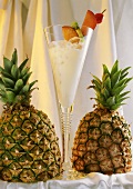 Pina Colada in a Glass with Two Pineapples