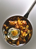 Fried potatoes with fried egg