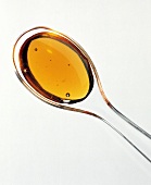 Honey on a Clear Spoon