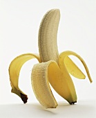 Single Banana; Half Peeled