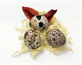 Three Quail Eggs on Lettuce