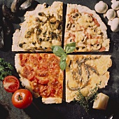 Four Assorted Pieces of Pizza