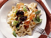 A Serving of Farfalle Pasta with Tomatoes and Olives