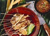 Skewered Chicken with Bowl of Peanut Sauce; Cleaver