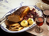 Marinated beef with potato dumplings & red cabbage
