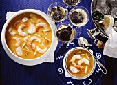Shrimp, lobster & tomato soup & a few champagne glasses