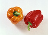 One Red Bell Pepper and One Orange Bell Pepper