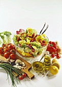 Mixed salad leaves with vegetables, décor: ingredients