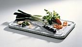 Assorted Vegetables on a Cutting Board; Knife