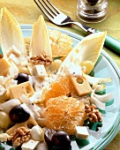 Chicory & cheese salad with oranges, grapes, walnuts