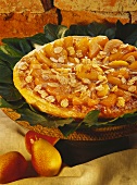 Pear tart with flaked almonds